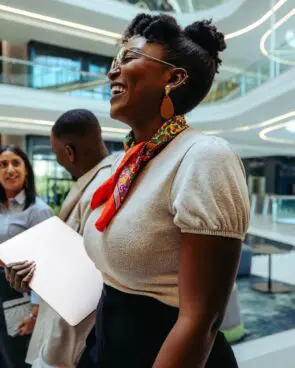 3 people touring an office