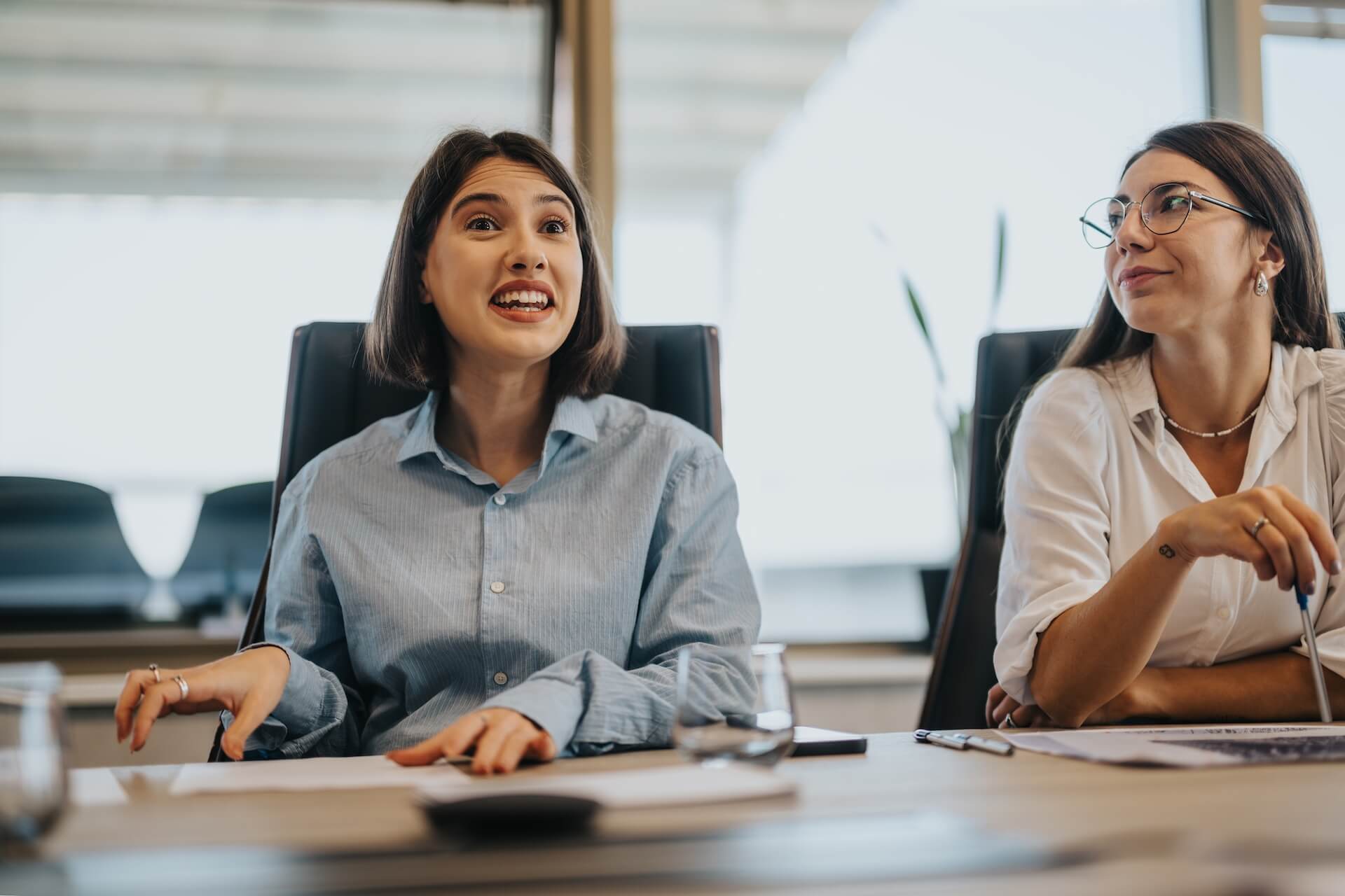 two women in a professional meeting