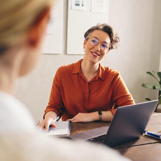 two women in a meeting